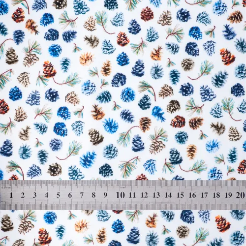 'Pinecone Party' fabric swatch with ruler for size reference